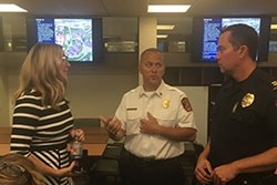 Employee talking to law enforcement officials